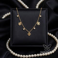 Cross Charm Tanmaniya Necklace
