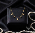 gold hamsa charm tanmaniya necklace anti tarnish
waterproof hamsa necklace stainless steel jewellery
gold anti tarnish necklace with hamsa hand design
daily wear hamsa charm necklace lightweight
stainless steel gold hamsa necklace with stones