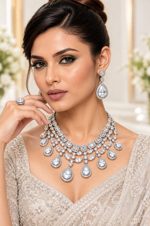 AD CZ Indian bridal jewellery featuring a multi-strand necklace with green gemstone accents and matching drop earrings for weddings and receptions