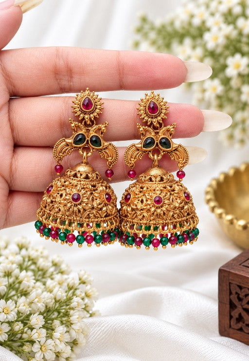 Alloy Kundan jhumka earrings with ruby red and emerald green stones and red green beaded drops