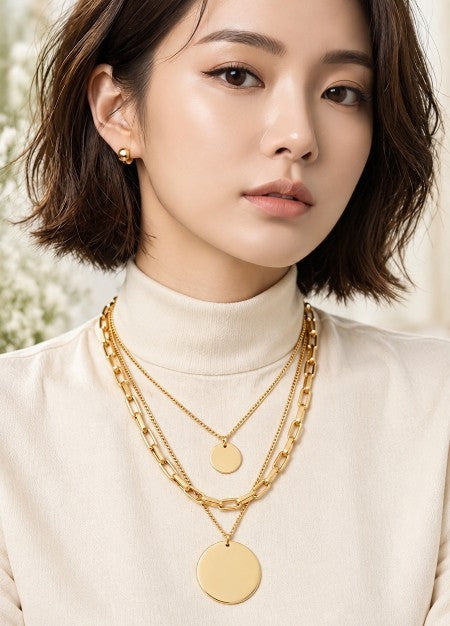 Anti tarnish gold-tone jewellery featuring statement ring, earrings, bracelet and modern jewellery set for women