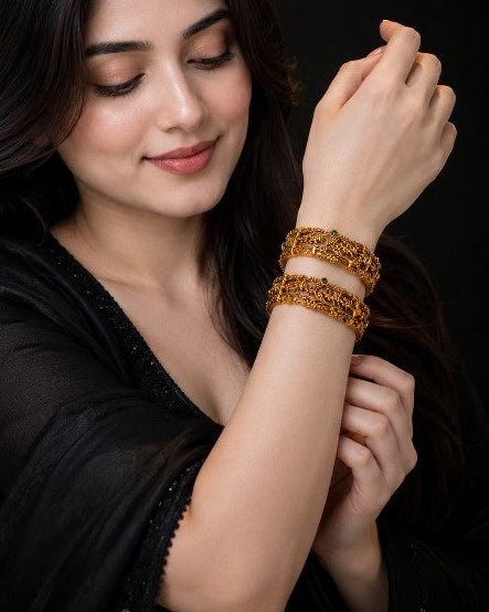 Antique gold nature inspired brass bangle with dark green and red enamel
