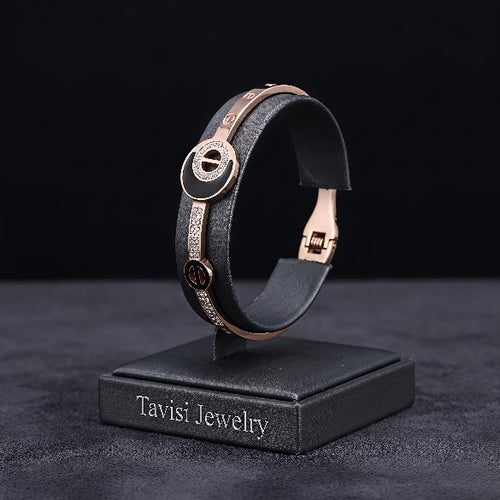 Tavisi black half moon bracelet with CZ stones in rose gold plated 316L surgical stainless steel with open lock design size 2.4
