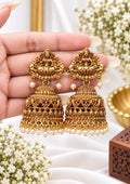 Divya Lakshmi gold-tone jhumka earrings with Goddess Lakshmi motif and white pearl drops
