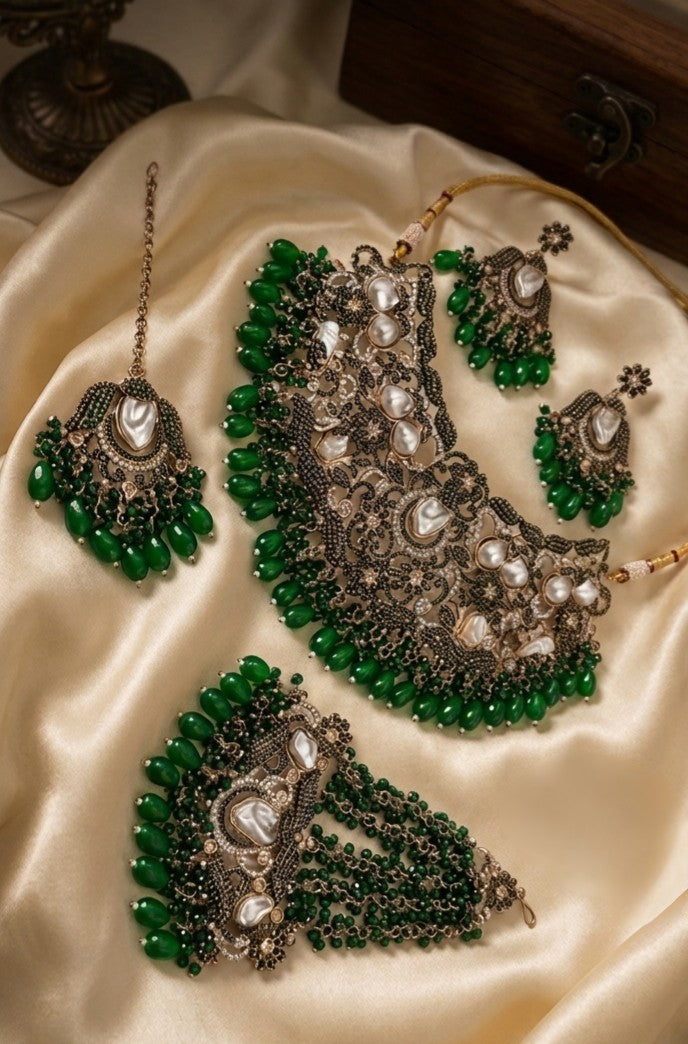 Premium heavy Turkish bridal jewelry set with statement choker, earrings, maang tikka, chutti, CZ stones, AD stones, baroque pearls and green bead detailing.