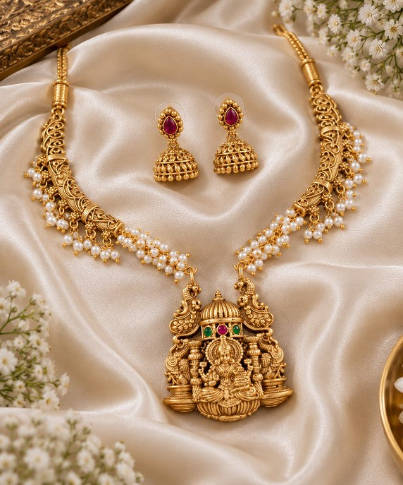 Gold plated South Indian Lakshmi necklace set with traditional temple jewellery pendant, pearl beads and matching Jhumka earrings