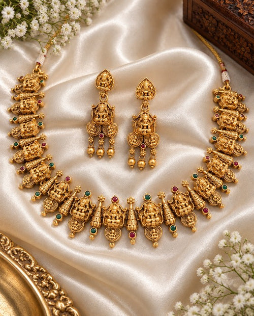 Lakshmi ruby emerald temple necklace with small coloured stones, gold tone alloy finish and traditional South Indian jewellery design