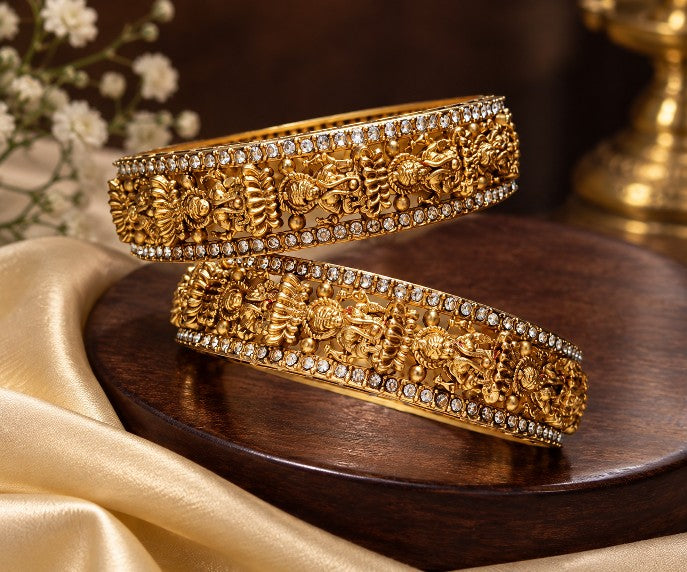 Goddess Lakshmi temple bangles with decorative stones, copper base and rich gold tone South Indian jewellery design