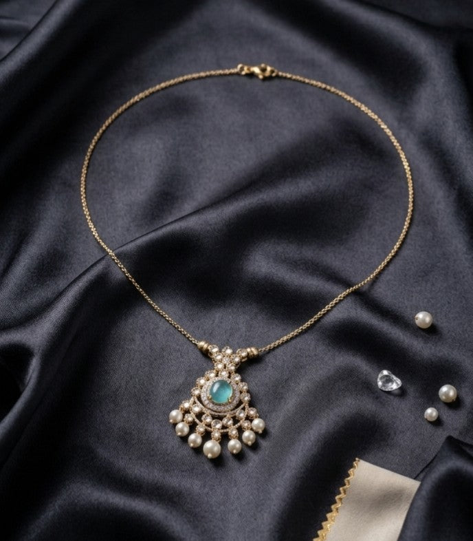 Madhavi alloy invisible chain pendant necklace with sparkling AD stone work and pearl drops for women