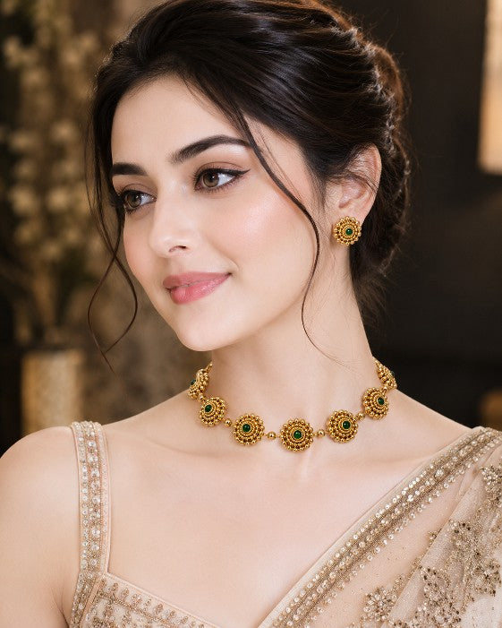 Mullai green stone gold plated jewellery set with multicolor stone detailing and matching earrings, elegant South Indian choker set for women
