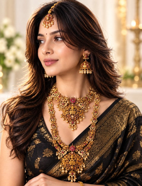 South Indian bridal jewellery collection featuring traditional gold-tone layered necklaces, jhumka earrings and maang tikka for weddings and special occasions