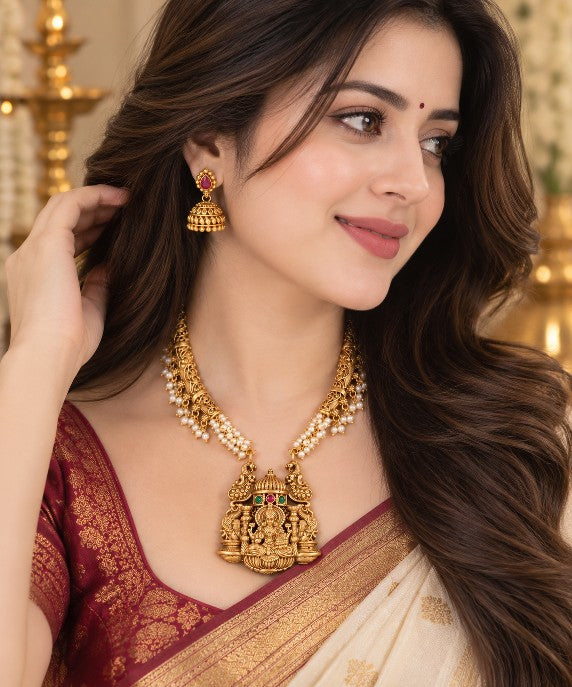 South Indian bridal Lakshmi necklace and Jhumka earrings set with high gold plated finish and traditional temple jewellery design