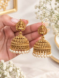 South Indian Lakshmi jhumka earrings with high gold plating, Goddess Lakshmi temple jewellery design and pearl bead drops