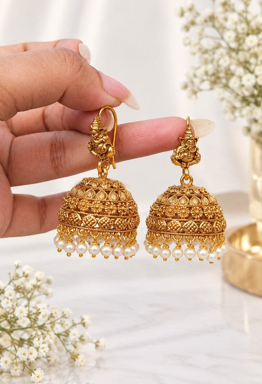 South Indian Vignesh hook jhumka earrings with gold plated finish, traditional temple jewellery design and pearl bead drops