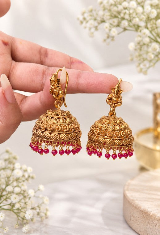 South Indian Vignesh hook jhumka earrings in medium size with gold plated traditional temple jewellery design and ruby red bead drops