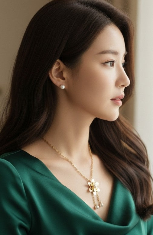Tavisi Elara Pearl Bloom necklace set for women with gold flower pendant and matching pearl earrings