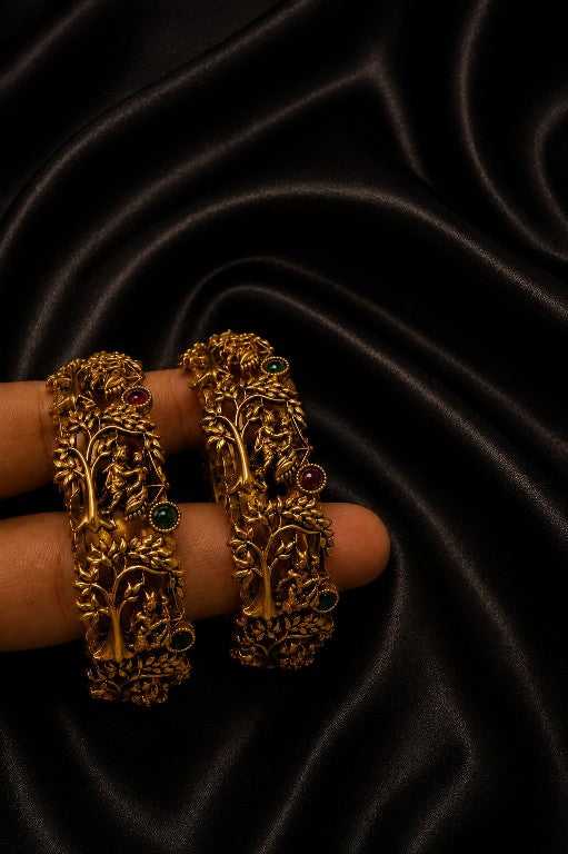 Traditional tree motif brass bangle with green and red enamel detailing