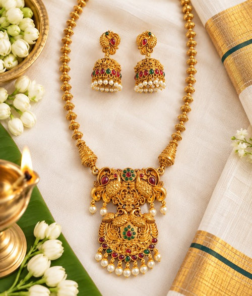 Aadhira premium antique high gold Haram jewelry set with matching earrings and pearl drops