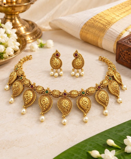 Premium brass paisley mango necklace and matching earrings with pearl drops