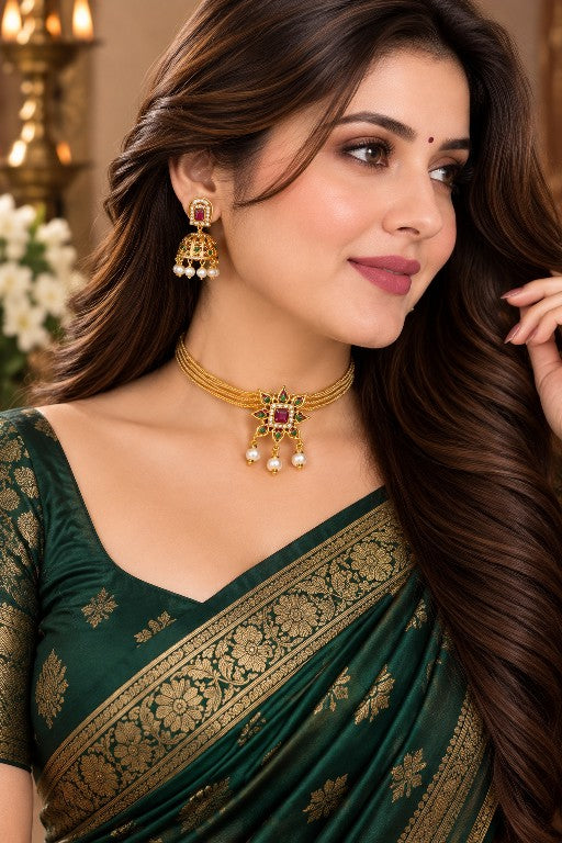 Aadhira Premium green and ruby traditional choker necklace set displayed with saree