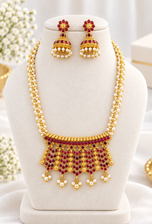 Mehendi Gold brass pendant necklace with pearl embellishments and jhumka earrings
