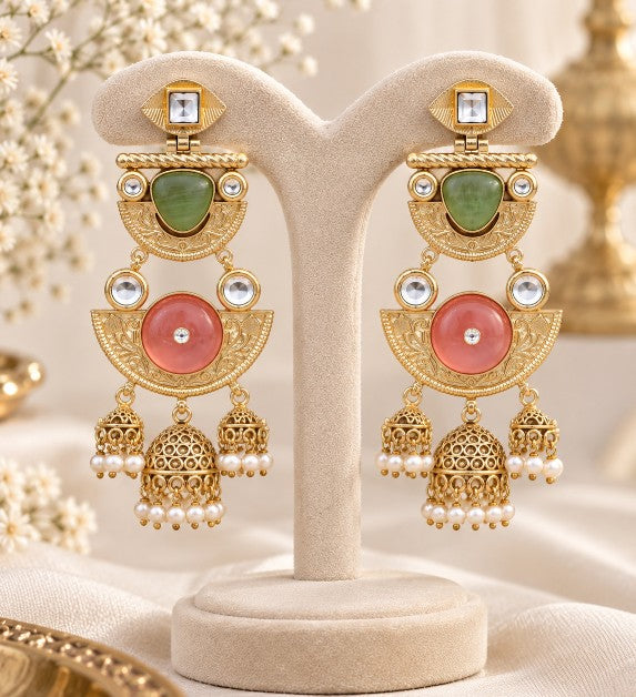 Avyara Premium ruby green AD jhumka earrings with white pearl detailing