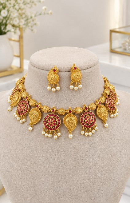 Devika ruby red traditional bridal choker necklace set with matching earrings and pearl drop detailing