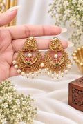 Devika premium brass Lakshmi Chandbali earrings with pearl drops in gold finish
