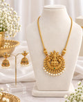 Dhanya antique gold Lakshmi pendant necklace set with matching Jhumka earrings