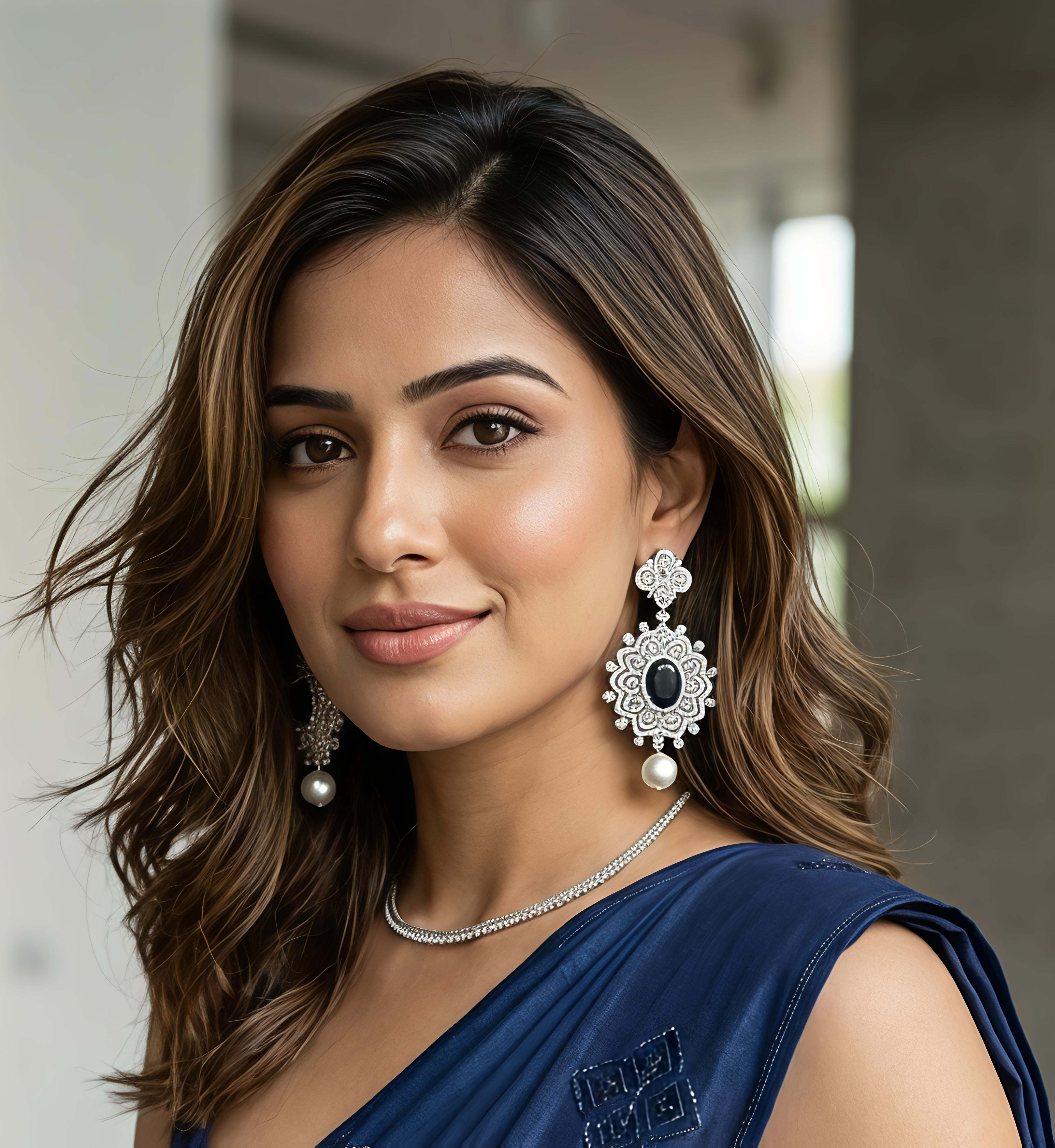 Detailed view of Tavisi Elara Midnight Mandala Drops with premium American Diamond stones, navy blue stones and pearl drops.