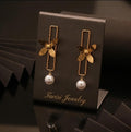 Tavisi floral bar pearl drop earrings with 22k gold plated anti tarnish stainless steel finish for women