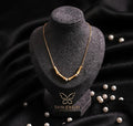 Gold Bamboo Pearl Necklace worn by model - Tavisi Jewelry Collection