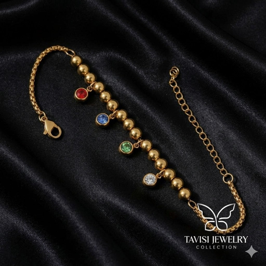 Gold Bead Multi-Colour CZ Charm Bracelet with red blue green crystal drops on white fabric - Tavisi Jewelry Collection