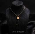 Gold Blue Stone Pendant Necklace worn by model - Tavisi Jewelry Collection
