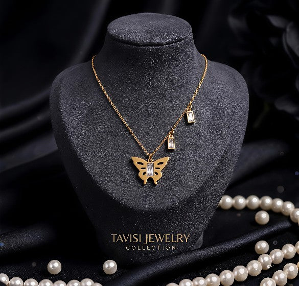 Gold Crystal Butterfly Pendant Necklace worn by model - Tavisi Jewelry Collection