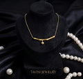 Gold Curved Bar Drop Necklace worn by model - Tavisi Jewelry Collection