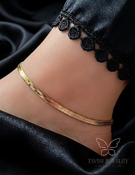Gold Herringbone Anklet on model – anti tarnish premium jewellery by Tavisi Jewely