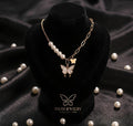 Gold Pearl Butterfly Charm Necklace worn by model - Tavisi Jewelry Collection