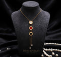 Gold Triple Disc Drop Necklace with White Red Black AD Stones worn by model - Tavisi Jewelry Collection