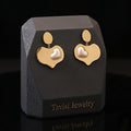 Tavisi golden heart pearl drop earrings with 22k gold plated anti tarnish stainless steel finish for women