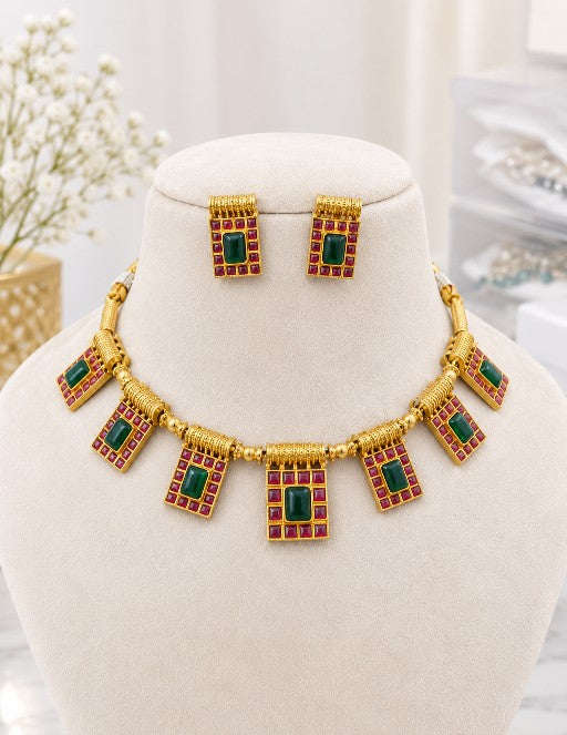 Ishani traditional Indian necklace with green centre stones and ruby red accents