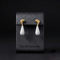Tavisi ivory drop gold hoop earrings with 22k gold plated stainless steel finish for women
