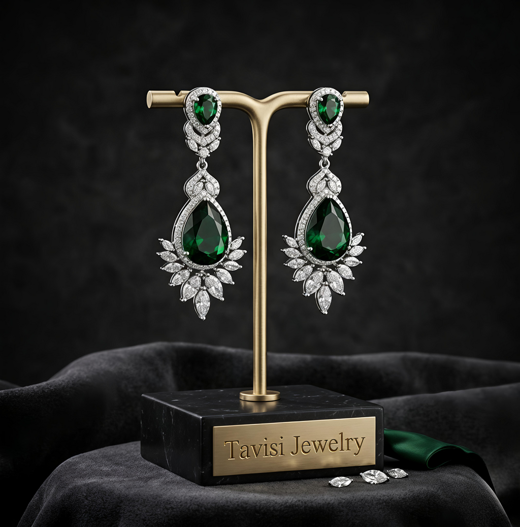 Tavisi Kiara Green Drops AD Dangler Earrings featuring sparkling American Diamond stones and elegant green teardrop stones.