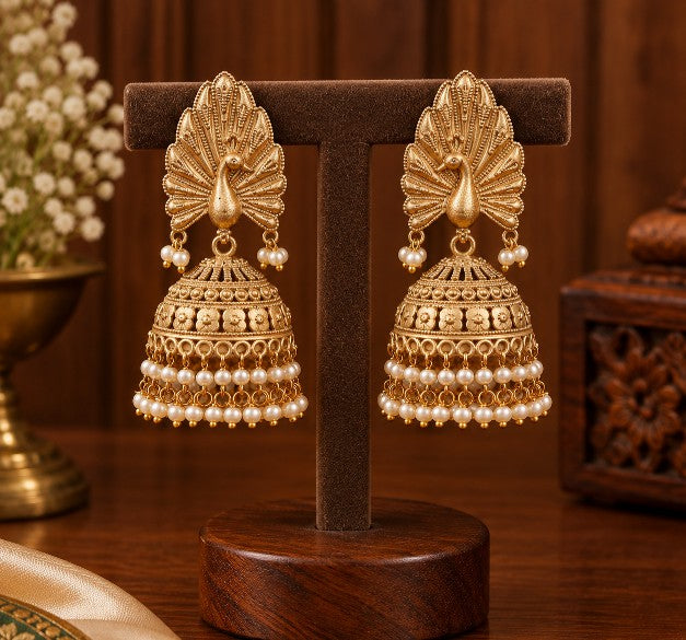 Navika Peacock Pearl Jhumka Earrings gold plated brass traditional earrings