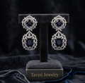 Tavisi Nayra Blue Royale AD Statement Earrings featuring sparkling American Diamond stones and luxurious navy blue centre stones.