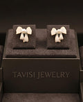 Tavisi pearl bow stud earrings in 22k gold plated surgical stainless steel for women