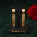 Tavisi pearl top tassel drop earrings in stainless steel with 22k gold anti tarnish finish for women