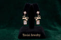 Tavisi rose charm CZ drop earrings in stainless steel with 18k rose gold anti tarnish finish and white cubic zirconia stones for women