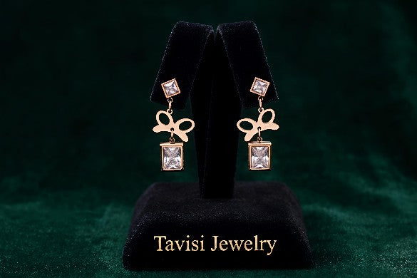 Tavisi rose charm CZ drop earrings in stainless steel with 18k rose gold anti tarnish finish and white cubic zirconia stones for women