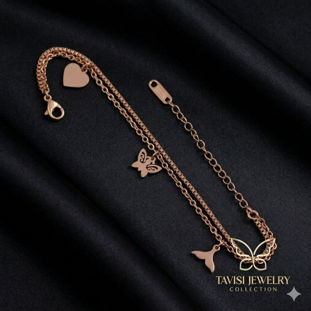 Rose Gold Butterfly Heart Charm Bracelet with dual layer chain on white background - Tavisi Jewelry Collection